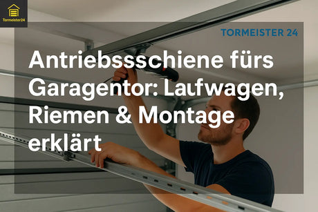 Techniker montiert Antriebsschiene an Garagendecke